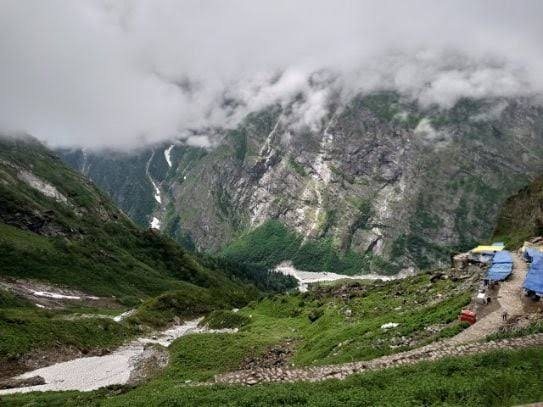 A green Himalayan valley holding the last village before the border